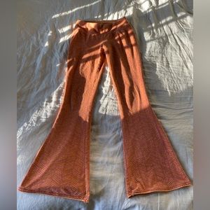 Prana womens size small flare pants. Orange/gold pattern.